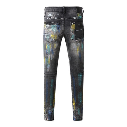 Fashionable Black Jeans with Bold Colorful Paint and Graffiti Detailing