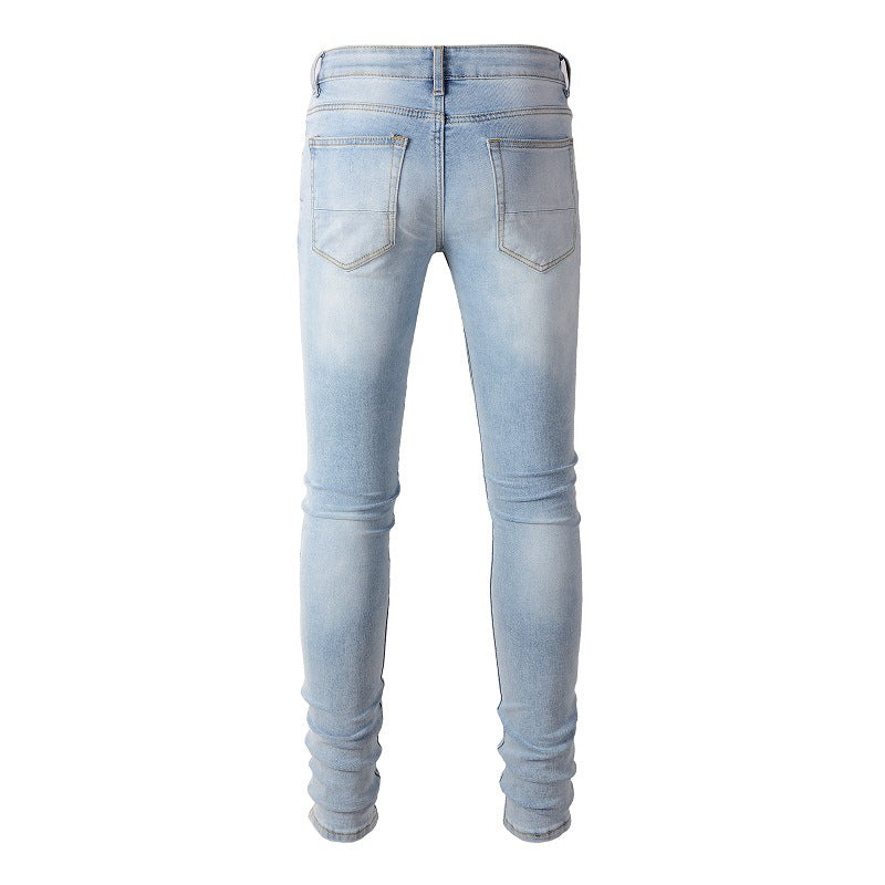 1307 European and American High Street Jeans Sticker Hand worn Ripped Jeans Slim fitting and Thin Small Feet Jeans